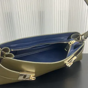 Leather color-blocking baguette bag, stylish underarm shoulder bag for women, chic and luxury.