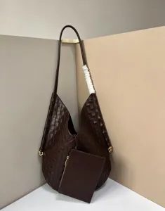 Soft woven leather shoulder tote bag with small pouch, large capacity luxury daily bag.