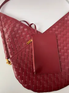 Soft woven shoulder tote bag with large capacity, luxury bordeaux leather hobo bag for women.
