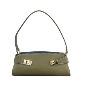 Olive green leather shoulder bag for women, stylish underarm baguette bag with metal buckle.