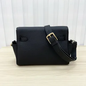 Black genuine leather messenger bag for women, chic buckle design, stylish shoulder bag.