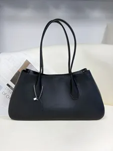 Premium genuine leather tote bag, minimalist black shoulder baguette bag for women stylish.