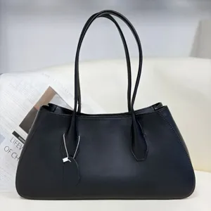 Black leather tote bag for women, stylish underarm shoulder bag with double straps.