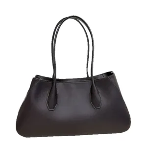 Premium leather shoulder bag for women, elegant black daily tote with comfortable dual handles.