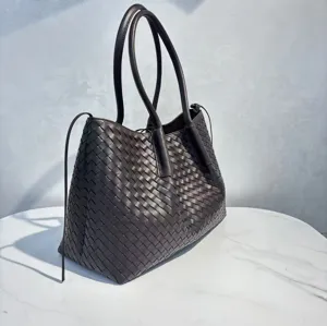 Dark brown woven leather tote bag, large capacity stylish shoulder bag for women daily use.