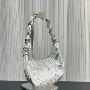 Silver metallic snakeskin hobo shoulder bag detailed view with chain handle.