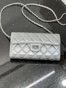 Silver quilted leather crossbody chain bag, stylish luxury style phone bag for women.