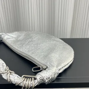 Silver metallic underarm bag, retro half-moon dumpling bag with stylish chain handle.