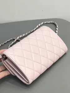Pink quilted leather chain bag, classic WOC crossbody shoulder bag with metal strap.