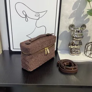 Brown suede woven vanity bag detail, premium leather handcrafted square shoulder bag view.
