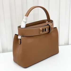 Brown leather handbag with metal stud closure, classic retro top handle women shoulder bag.