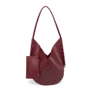 Burgundy woven leather detail showcasing intricate intrecciato pattern and matching zip pouch bag.