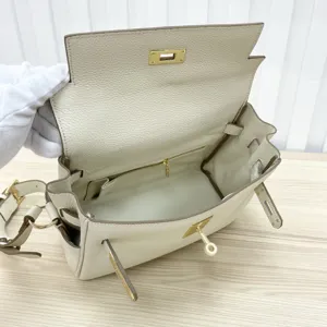 Genuine leather Kelly messenger bag for women, stylish top handle shoulder crossbody bag.