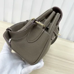Genuine leather women's shoulder crossbody bag with premium metal hardware and elegant stitching.