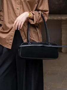 Black suede shoulder bag detail, retro Boston baguette handbag with double straps for women.