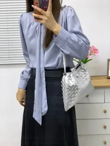 Metallic silver woven leather shoulder bag, large capacity casual drawstring cloud bag.