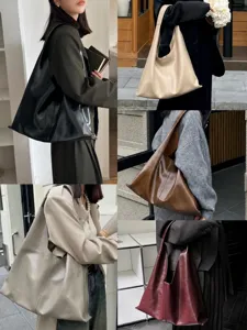 Sac cabas souple minimaliste en cuir grande capacité pour femme style décontracté chic.