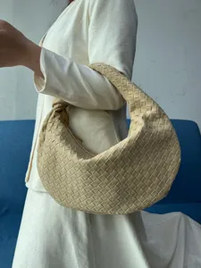 Elegant suede woven shoulder bag for women, large slouchy hobo dumpling bag fashion style.