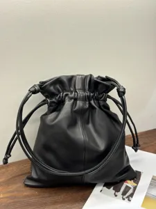 Black leather drawstring pouch bag, minimalist soft cloud shoulder bag for women.