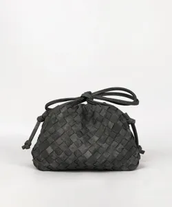 Dark grey woven clutch bag with knotted drawstring handle, stylish minimalist design.
