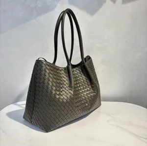 Luxury woven leather tote bag for women, large capacity shoulder bag and elegant handbag.