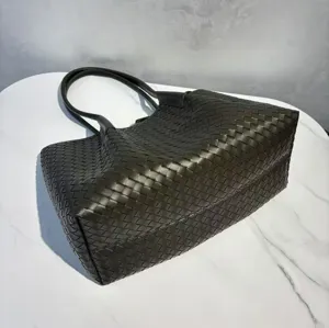 Genuine leather woven tote bag for women, large capacity shoulder bag with double handles.
