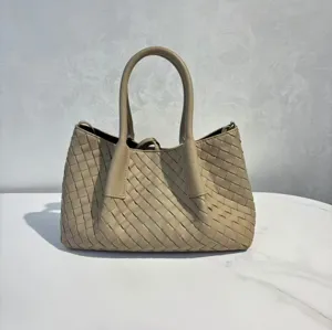 Genuine leather woven tote bag for women, large capacity shoulder shopping handbag daily use.