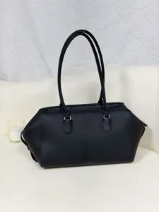 Black genuine leather East West bowling bag minimalist large capacity shoulder tote bag.
