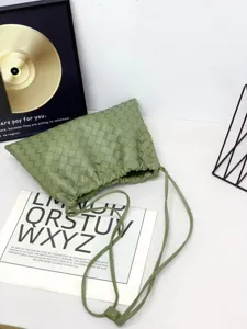 Light green woven leather pouch shoulder bag, casual drawstring cloud bag for women.