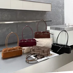 Retro suede baguette bag for women, trendy leather shoulder handbag for autumn.