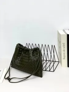 Dark green woven leather crossbody bag stylish shoulder pouch with drawstring design.