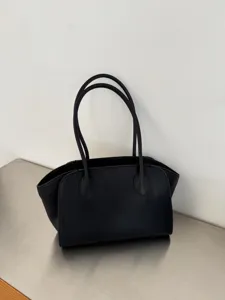 Minimalist black leather tote bag, large capacity shoulder bag for women daily commute.