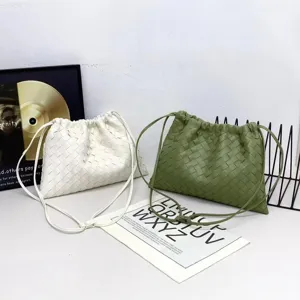 Woven leather drawstring shoulder bag, casual crossbody cloud pouch for women daily use.