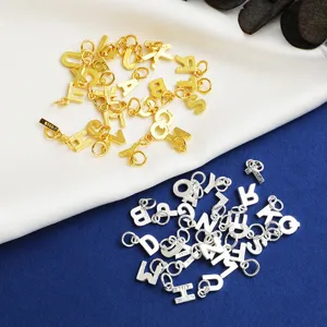 Variety of S925 sterling silver letter charms in gold and silver finishes for DIY jewelry