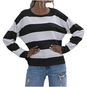 Detailed view of cozy black and white striped loose knit pullover sweater for women