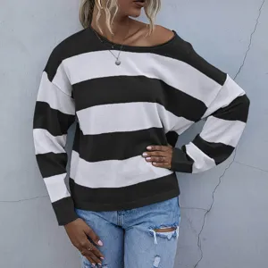 Detail view of women striped knit sweater with casual loose fit style