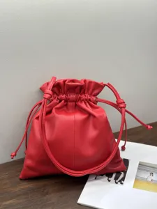 Red genuine leather drawstring bucket bag, large capacity minimalist cloud bag for women details.