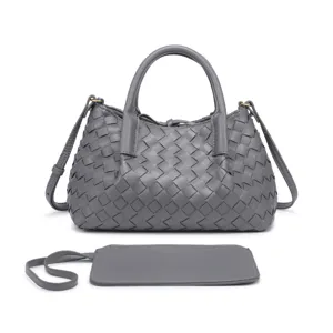 Detailed view of the gray woven leather handbag featuring intricate intrecciato design pattern.
