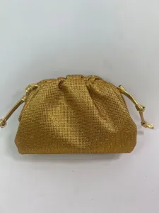Gold rhinestone cloud pouch evening handbag with drawstring closure, elegant party clutch.