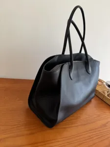 Black leather tote bag for women, large capacity minimalist shoulder handbag for daily work.