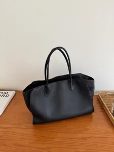 Black leather tote bag for women, large capacity minimalist shoulder handbag for daily work commute.