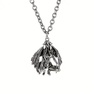 Detailed view of gothic demon angel pendant necklace, metal chain accessory, dark style jewelry