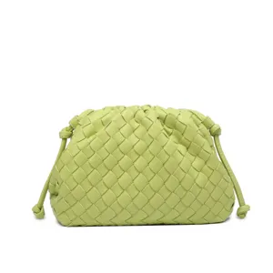 Light green woven leather clutch bag, soft cloud dumpling pouch with knotted side details.