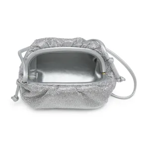 Crystal embellished silver clutch bag detail showcasing sparkling rhinestones and frame.