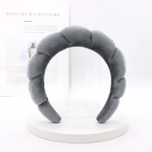 Grey velvet padded cloud headband detail shot, plush sponge hair hoop for makeup and washing.