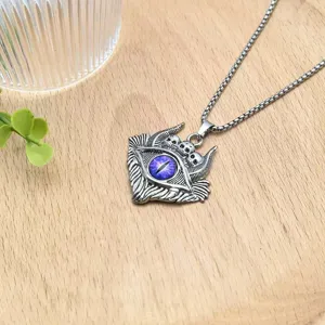 Gothic evil eye skull pendant necklace closeup, detailed demon eye jewelry for men and women.