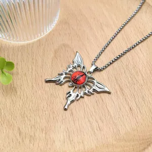 Gothic devil eye wing necklace pendant, cool punk style metal sweater chain jewelry detail.