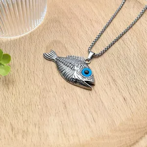 Silver evil eye fish skeleton pendant necklace detail, retro punk style jewelry accessory.