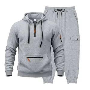 Men's grey fleece-lined hooded sweatshirt and cargo sweatpants set, casual outdoor detail view.