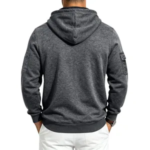 Dark grey fleece lined hoodie detail view, showing back design with hood and sleeve pockets.